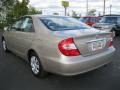 2003 Desert Sand Mica Toyota Camry LE  photo #15