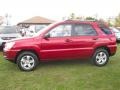 2010 Volcanic Red Kia Sportage LX V6 4x4  photo #9