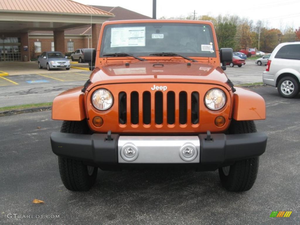 2011 Wrangler Sahara 4x4 - Mango Tango Pearl / Black photo #2