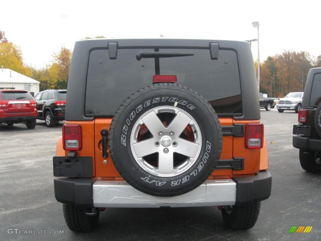 2011 Wrangler Sahara 4x4 - Mango Tango Pearl / Black photo #4