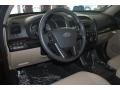 Beige 2011 Kia Sorento LX V6 Steering Wheel