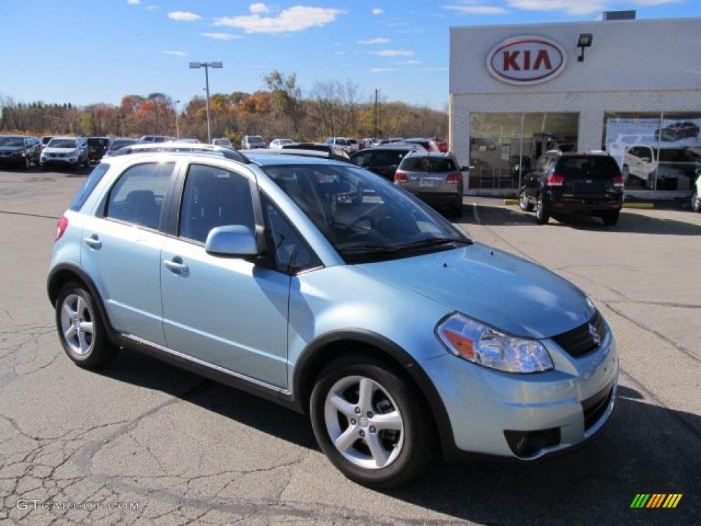 2009 SX4 Crossover Touring AWD - Vapor Blue Metallic / Black photo #1