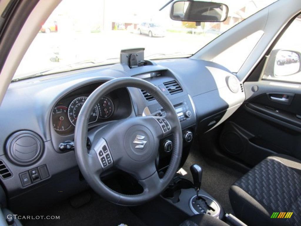2009 SX4 Crossover Touring AWD - Vapor Blue Metallic / Black photo #7