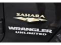 2011 Jeep Wrangler Unlimited Sahara 4x4 Badge and Logo Photo