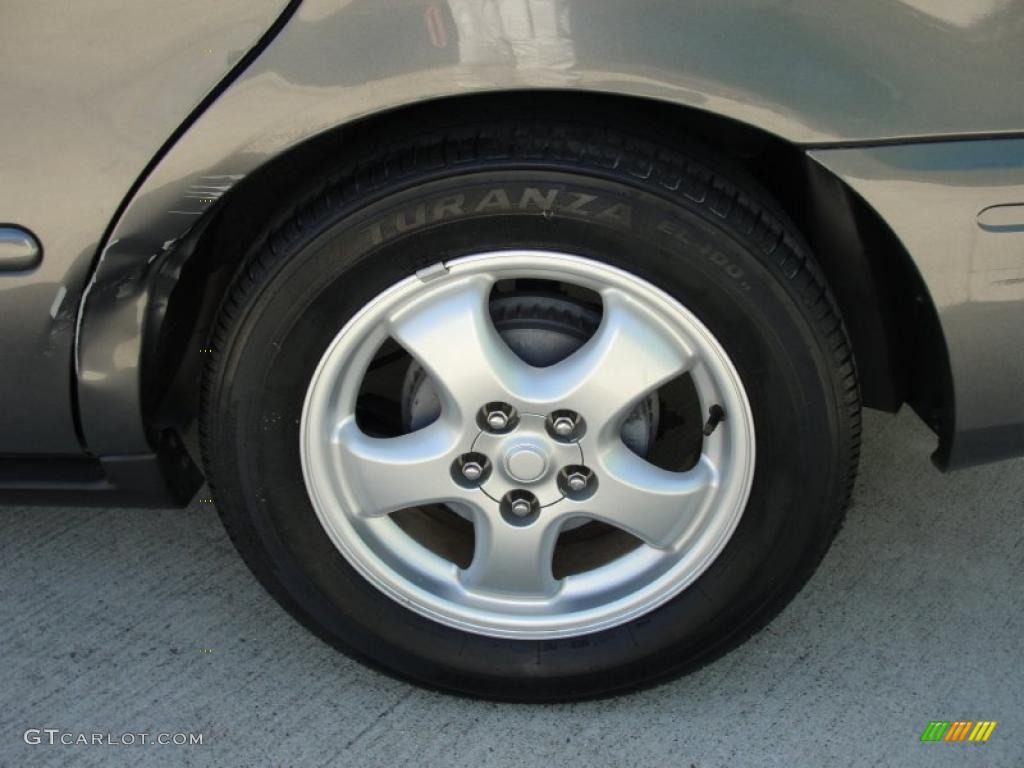 2004 Taurus SE Sedan - Dark Shadow Grey Metallic / Medium Graphite photo #13