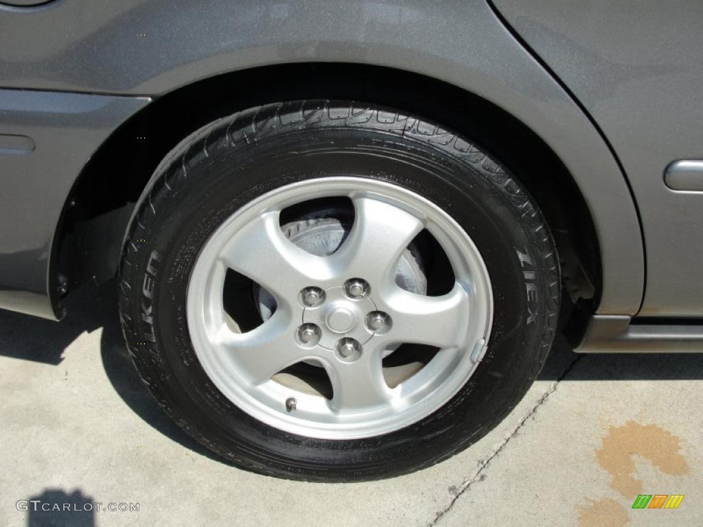 2004 Ford Taurus SE Sedan Wheel Photo #38881357