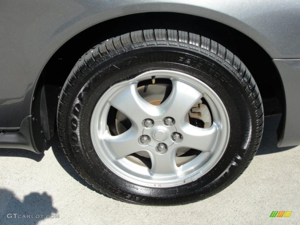 2004 Ford Taurus SE Sedan Wheel Photo #38881381