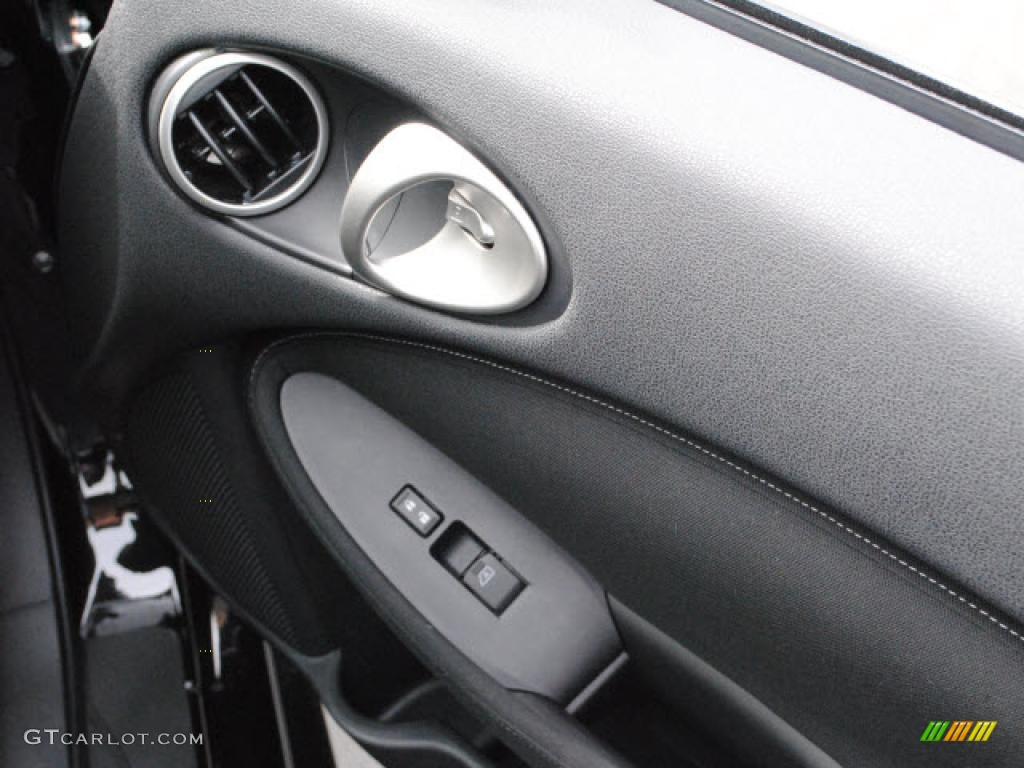 2009 Nissan 370Z Touring Coupe Black Leather Door Panel Photo #38898686