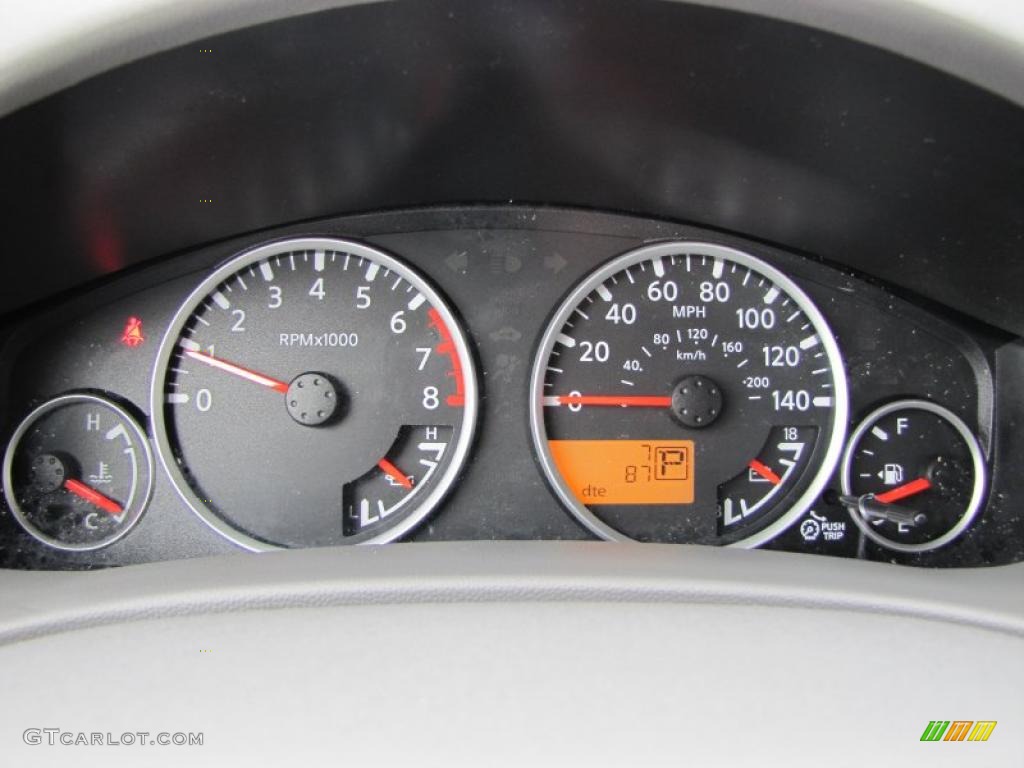 2011 Nissan Frontier SL Crew Cab Gauges Photo #38911510
