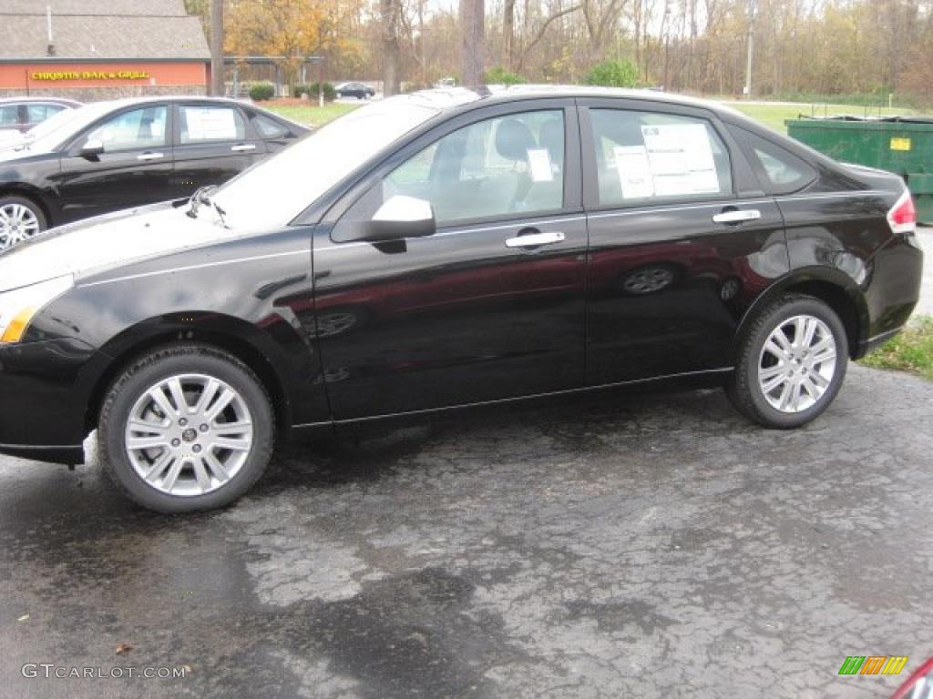 2011 Focus SEL Sedan - Ebony Black / Charcoal Black photo #1