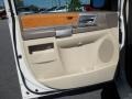 Medium Pebble Beige/Cream Door Panel Photo for 2010 Chrysler Town & Country #38971180