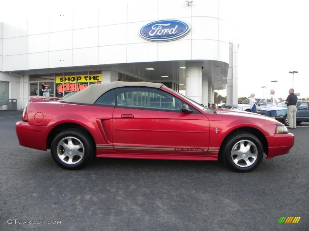 Laser Red Metallic 2000 Ford Mustang V6 Convertible Exterior Photo #38976311