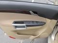 2010 Saturn VUE Tan Interior Door Panel Photo