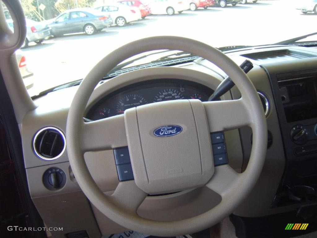 2004 Ford F150 XLT SuperCab Tan Steering Wheel Photo #39010775
