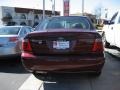 2007 Dark Toreador Red Metallic Ford Focus ZX4 SE Sedan  photo #5