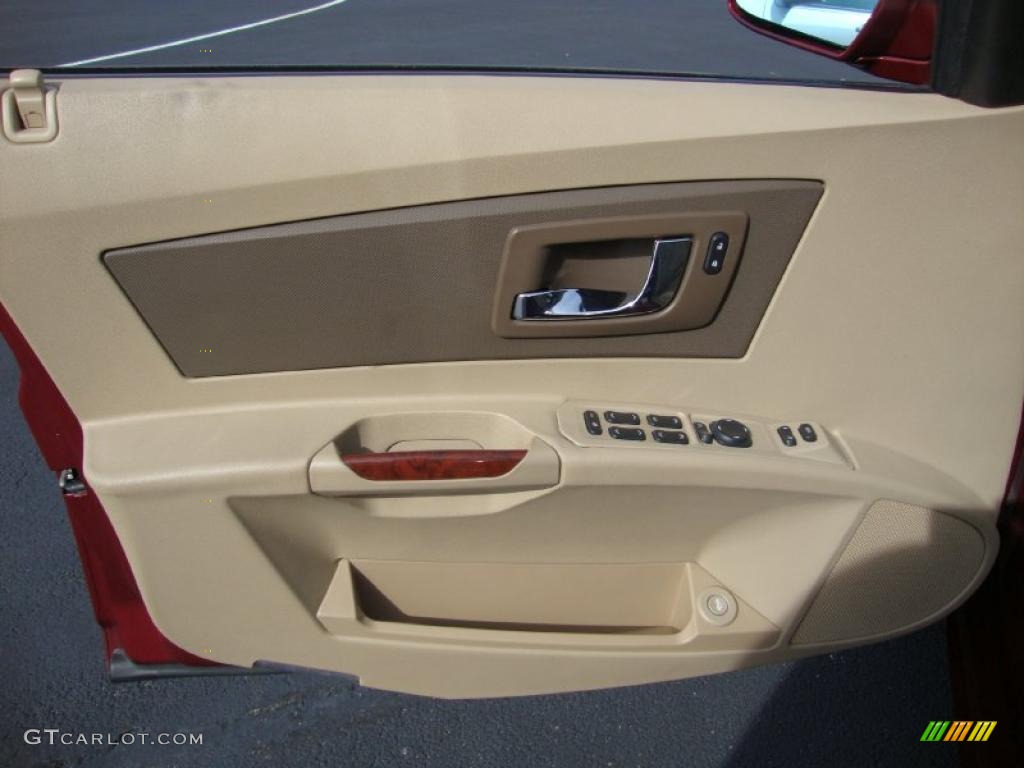 2006 Cadillac CTS Sport Sedan Cashmere Door Panel Photo #39019487