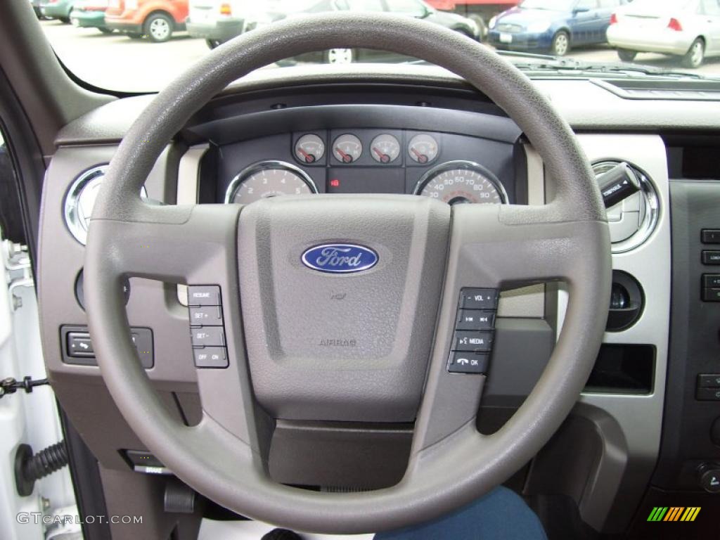 2009 Ford F150 XLT SuperCab Stone/Medium Stone Steering Wheel Photo #39054636