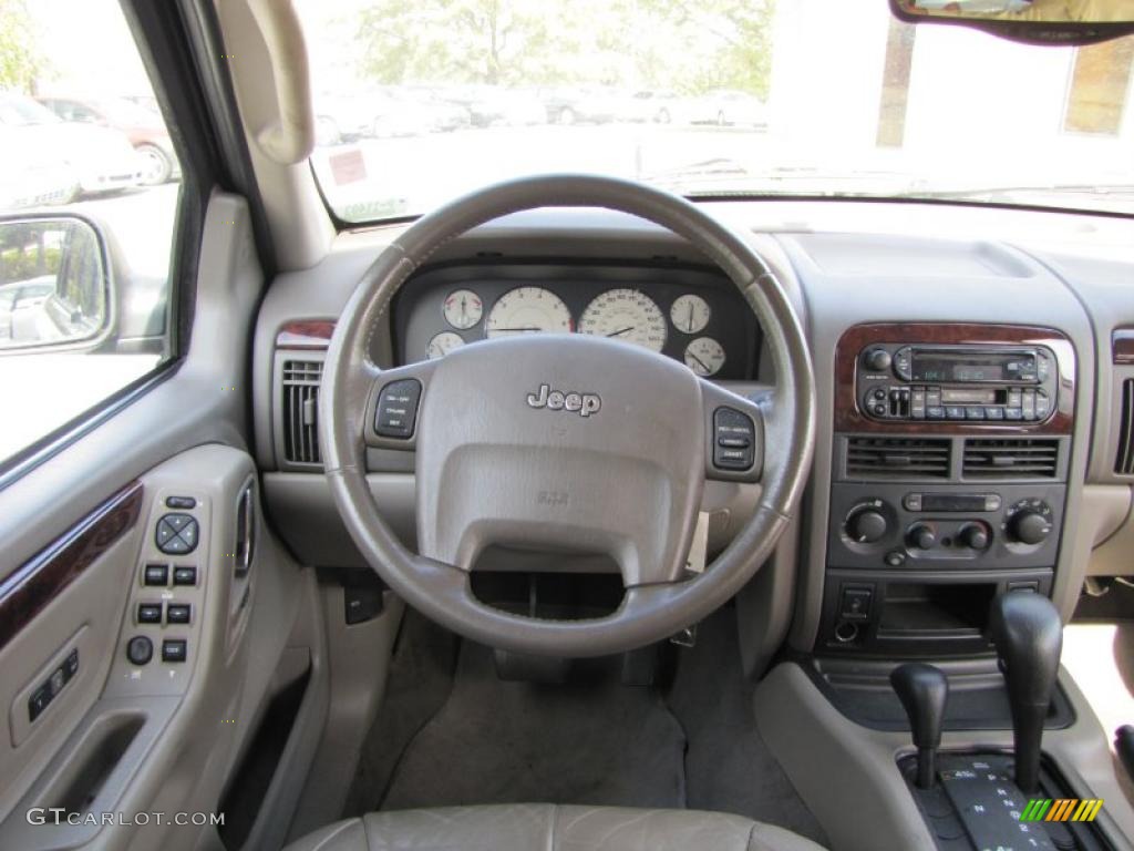 2004 Jeep Grand Cherokee Limited 4x4 Sandstone Steering Wheel Photo #39073203