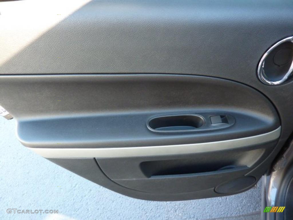 2011 Chevrolet HHR LS Ebony Door Panel Photo #39074875