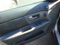 Dark Charcoal 2000 Ford Taurus SES Door Panel
