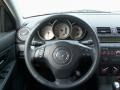 Black 2009 Mazda MAZDA3 i Touring Sedan Dashboard