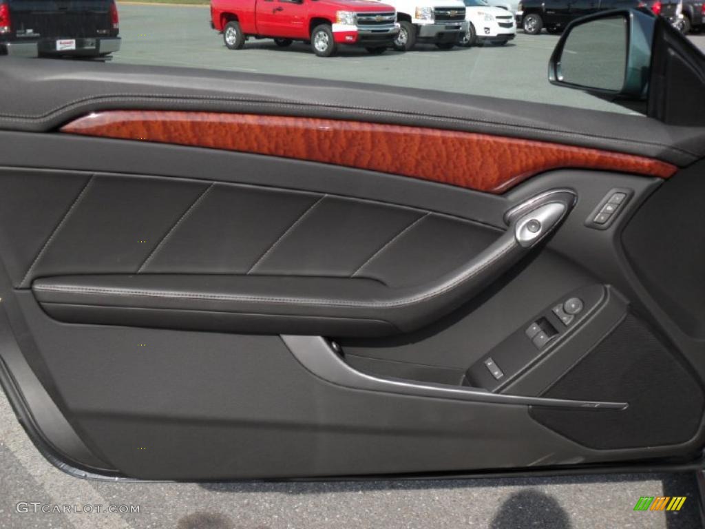 2011 Cadillac CTS Coupe Ebony Door Panel Photo #39100426