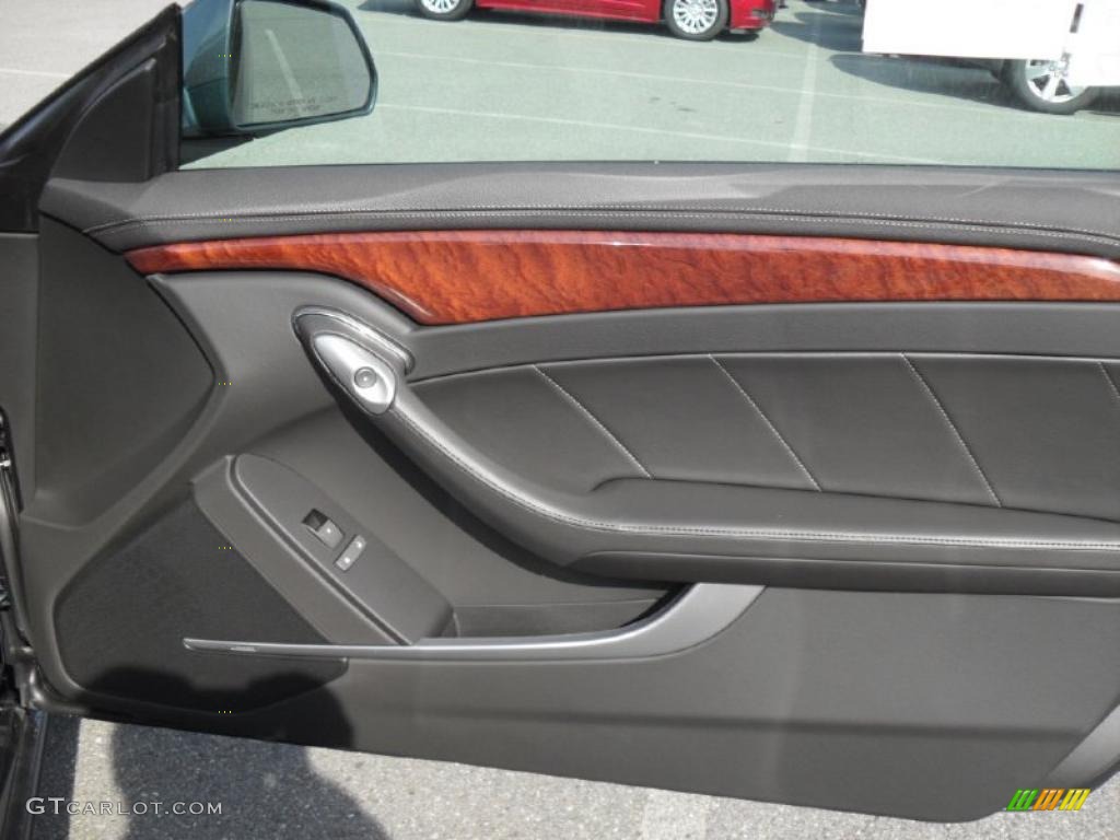 2011 Cadillac CTS Coupe Ebony Door Panel Photo #39100630