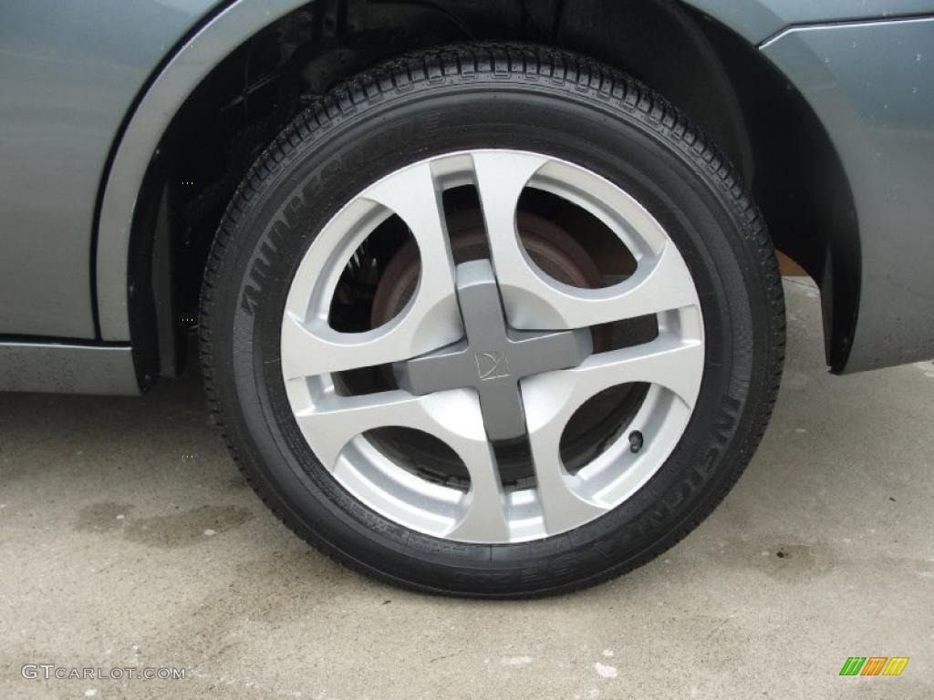 2004 Saturn ION 3 Sedan Wheel Photo #39104373