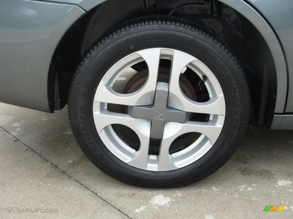 2004 Saturn ION 3 Sedan Wheel Photo #39104397