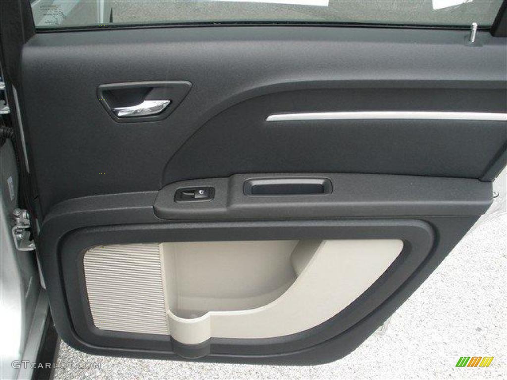 2009 Dodge Journey SXT Dark Slate Gray/Light Graystone Door Panel Photo #39105645