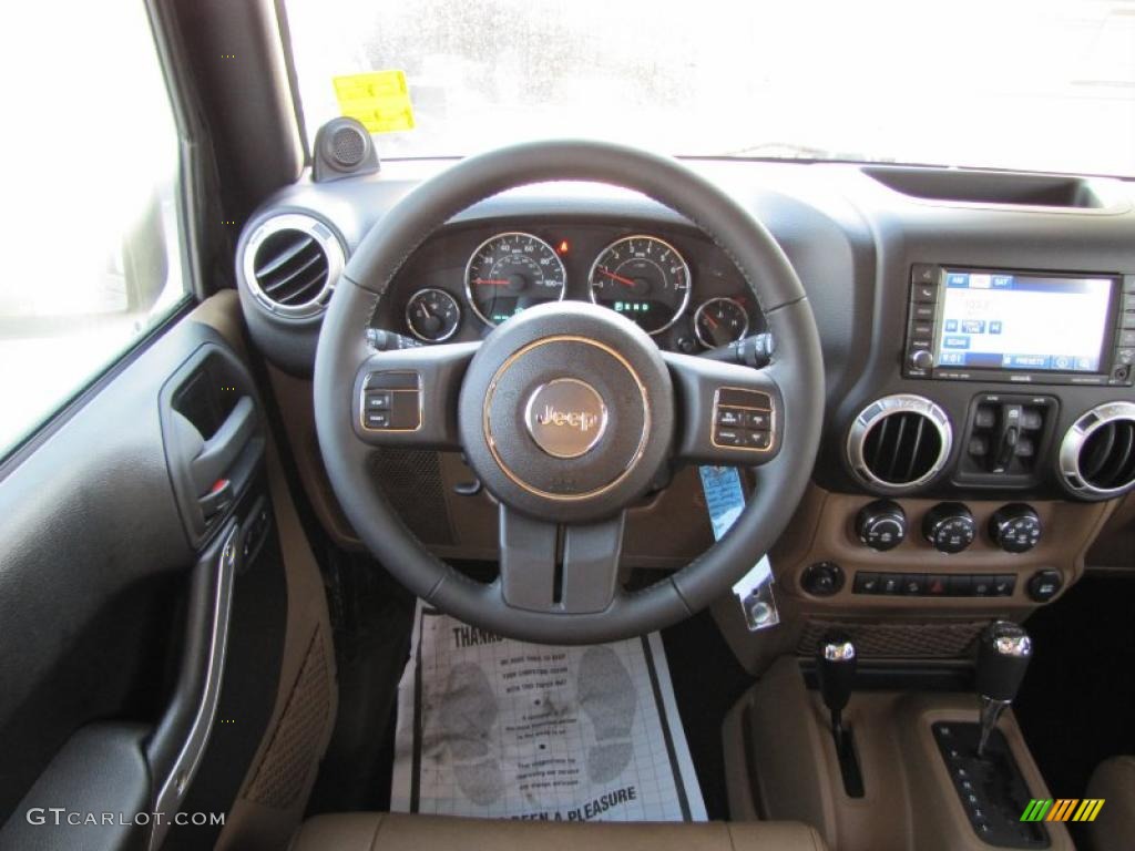 2011 Jeep Wrangler Unlimited Sahara 4x4 Black/Dark Saddle Dashboard Photo #39114036