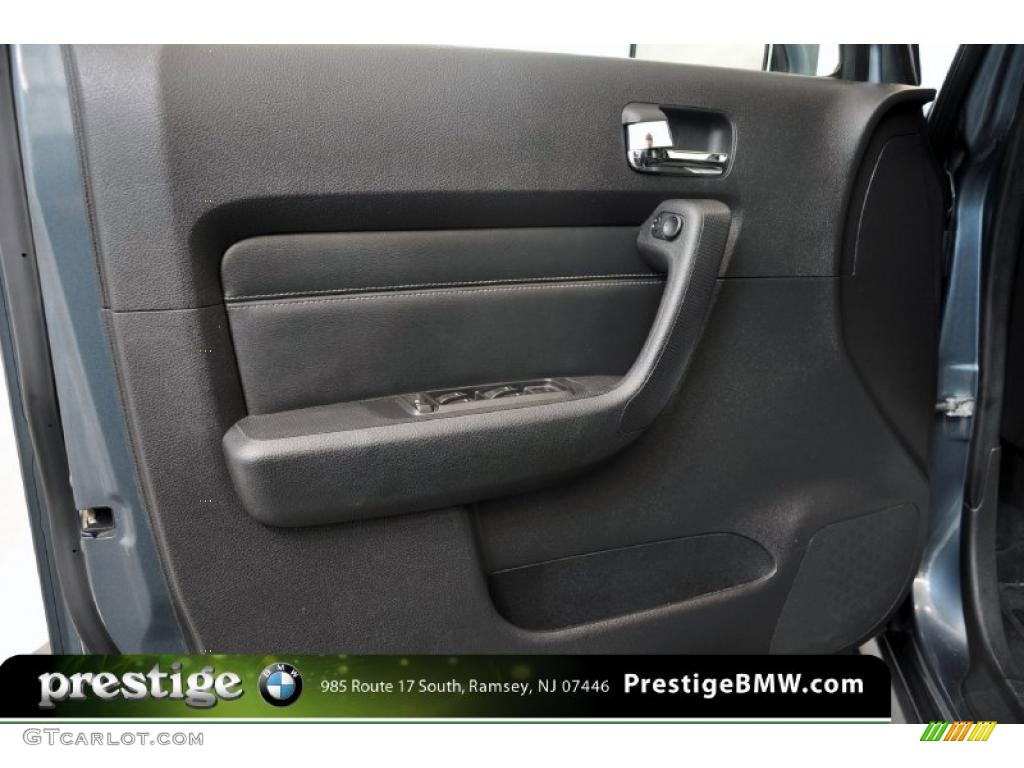 2006 Hummer H3 Standard H3 Model Ebony Black Door Panel Photo #39131403