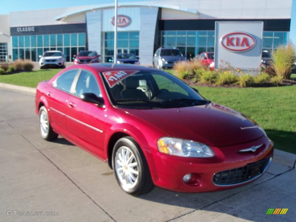 2003 Sebring LXi Sedan - Inferno Red Tinted Pearl / Sandstone photo #1