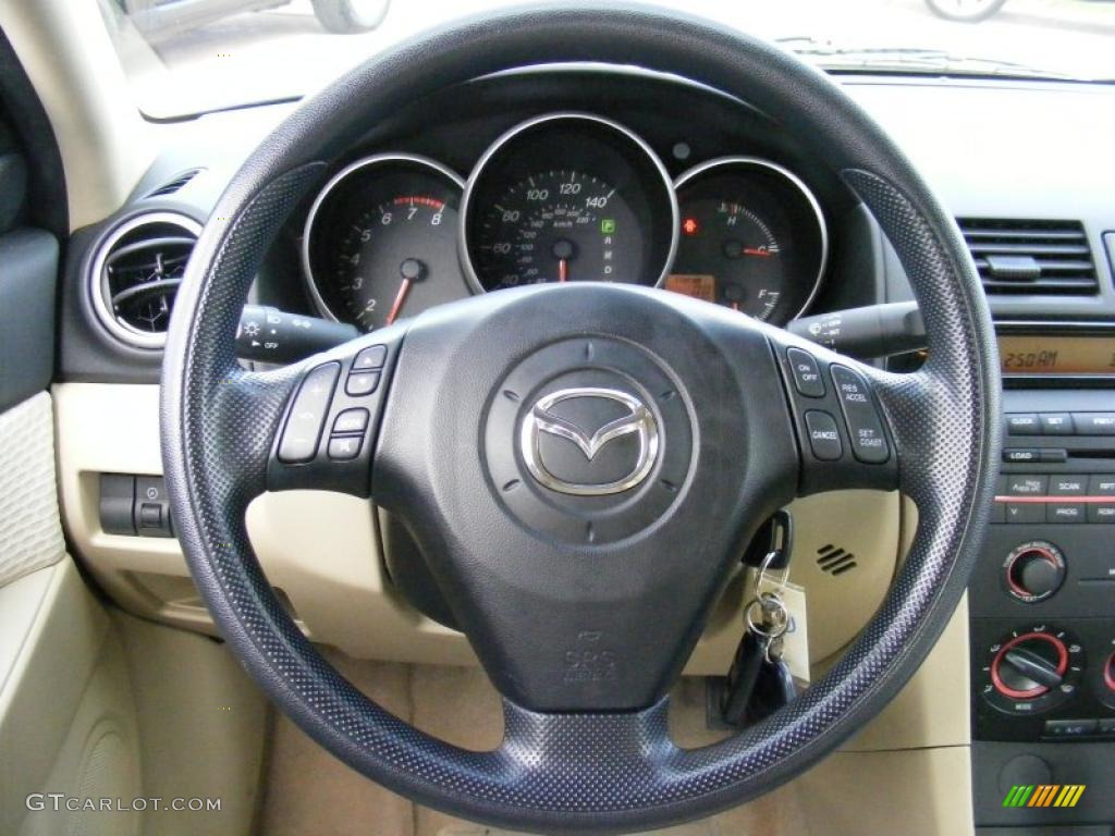 2004 Mazda MAZDA3 i Sedan Beige Steering Wheel Photo #39137822