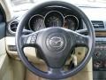 2004 Mazda MAZDA3 Beige Interior Steering Wheel Photo