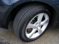 2004 Mazda MAZDA3 i Sedan Wheel and Tire Photo