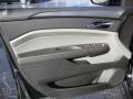 Ebony/Titanium Door Panel Photo for 2011 Cadillac SRX #39139882