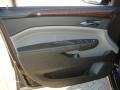 Ebony/Titanium Door Panel Photo for 2011 Cadillac SRX #39140238