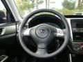 Black 2010 Subaru Forester 2.5 X Steering Wheel