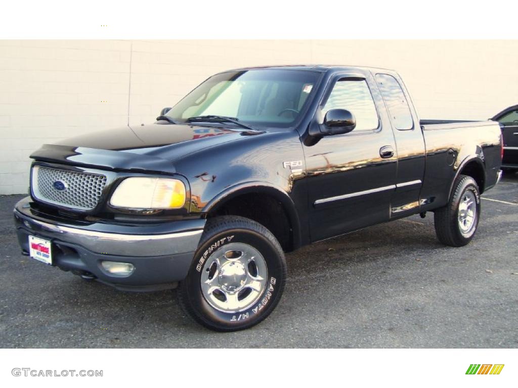 1999 F150 XLT Extended Cab 4x4 - Black / Medium Graphite photo #1