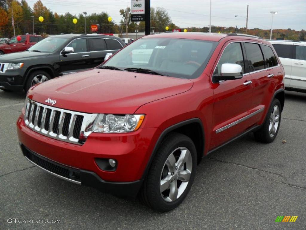 2011 Grand Cherokee Overland 4x4 - Inferno Red Crystal Pearl / Dark Frost Beige/Light Frost Beige photo #1