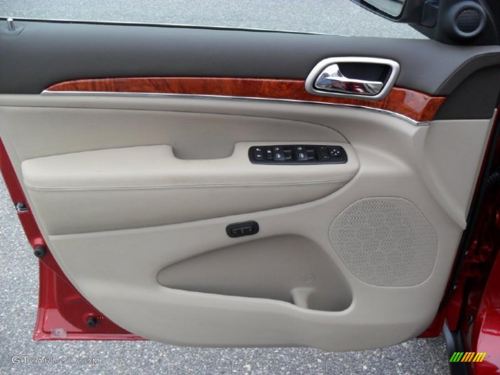 2011 Jeep Grand Cherokee Overland 4x4 Dark Frost Beige/Light Frost Beige Door Panel Photo #39186014