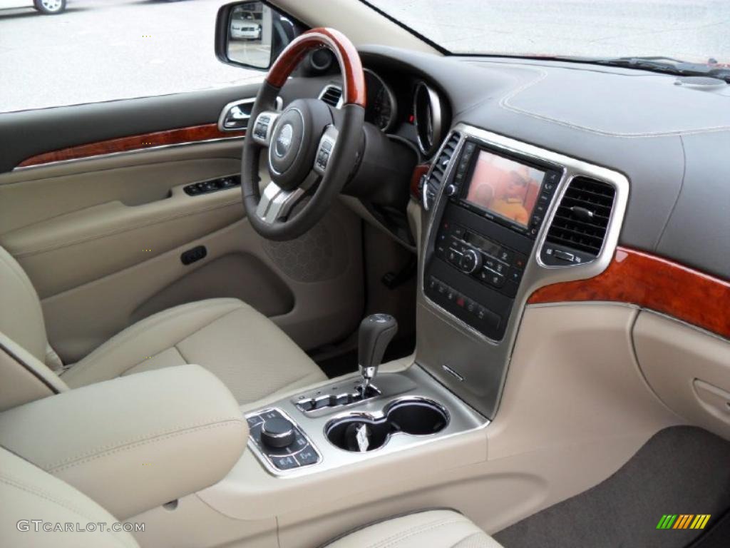 2011 Jeep Grand Cherokee Overland 4x4 Dark Frost Beige/Light Frost Beige Dashboard Photo #39186325