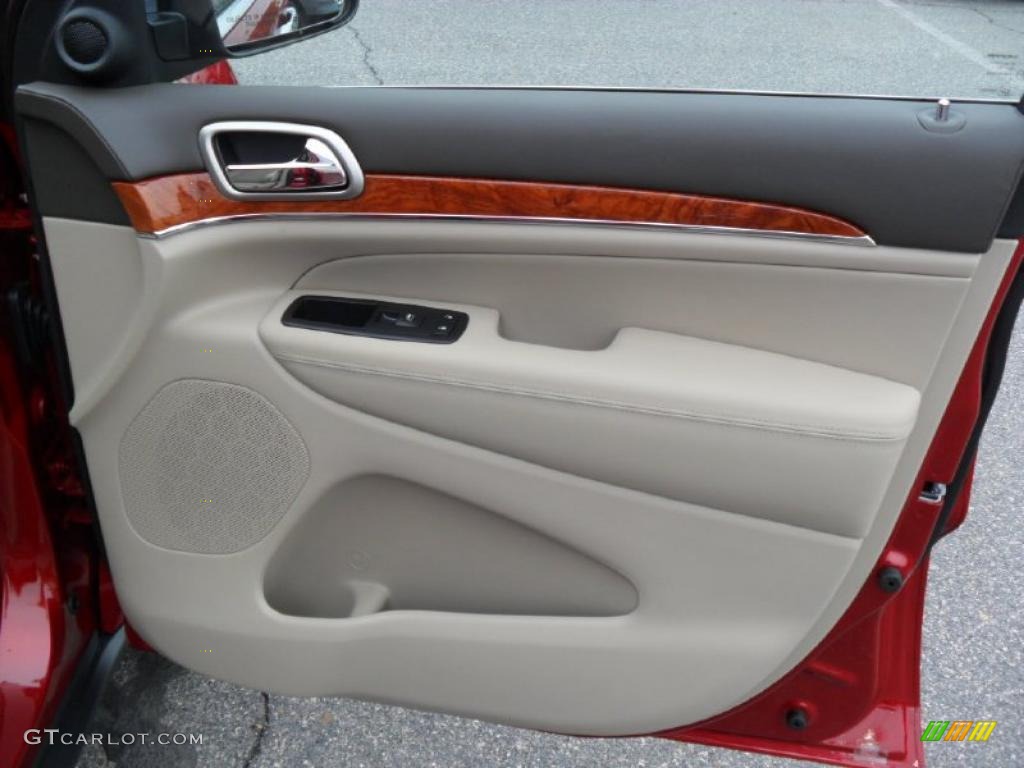 2011 Jeep Grand Cherokee Overland 4x4 Dark Frost Beige/Light Frost Beige Door Panel Photo #39186340