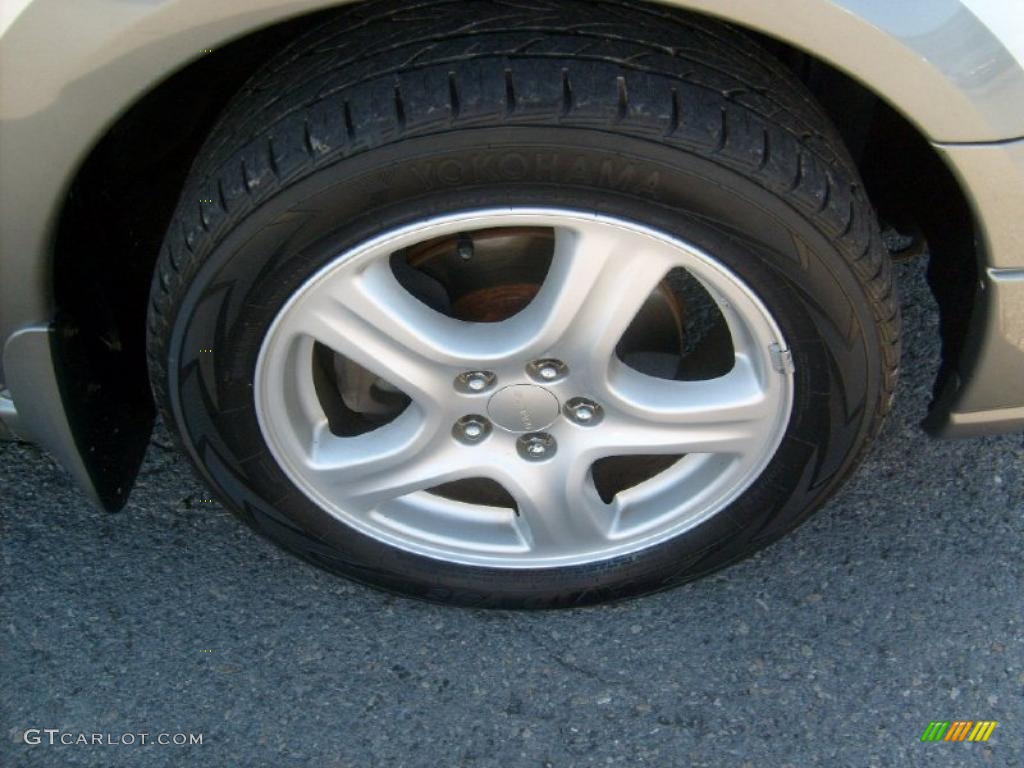 2004 Subaru Impreza Outback Sport Wagon Wheel Photo #39189083