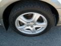 2004 Subaru Impreza Outback Sport Wagon Wheel and Tire Photo