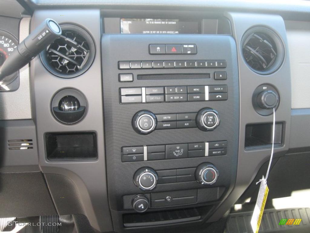 2010 F150 XL Regular Cab - Tuxedo Black / Medium Stone photo #9