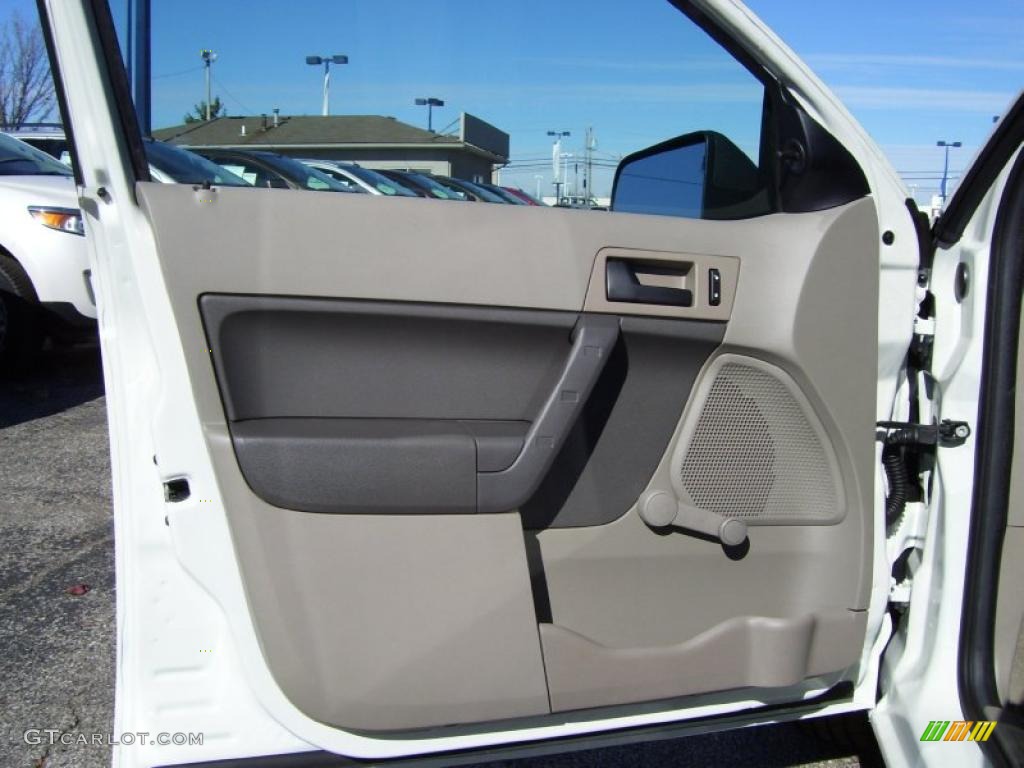 2011 Ford Focus S Sedan Medium Stone Door Panel Photo #39197859