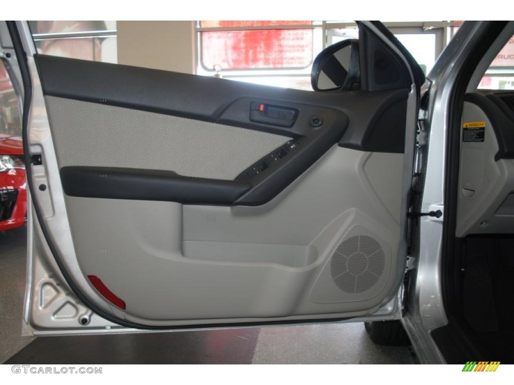 2011 Kia Forte EX Stone Door Panel Photo #39198523