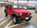 Flame Red 2011 Jeep Wrangler Unlimited Rubicon 4x4 Exterior